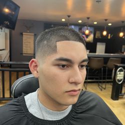 Mid fade with a line up and razor edge finished