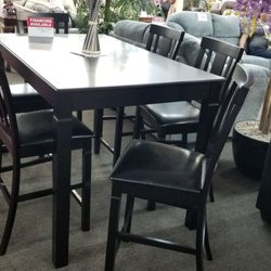 Innovations Home Furniture - My new dinning set counter height 60x36.  Great price compared to the other places I visited.