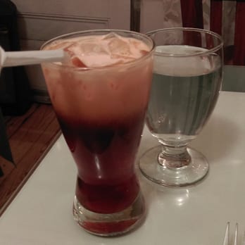 Bangkok Cuisine - Thai iced tea. Look what they did with the straw! - Thai Near Me - Oak Bluffs, Massachusetts Bangkok Cuisine - Thai iced tea. Look what they did with the straw! - Thai Near Me - Oak Bluffs, Massachusetts
