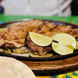 El Tapatio - Carne asada on sizzling plate with onions & limes. (Ordered off menu)