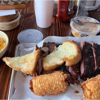 Ray's Real Pit BBQ Shack - Four Meat Plate... ribs, brisket, turkey, and sausage, with corn on the cob "deep fried", and Smoked Mac and Cheese! - Barbeque Near Me - Houston, Texas Ray's Real Pit BBQ Shack - Four Meat Plate... ribs, brisket, turkey, and sausage, with corn on the cob "deep fried", and Smoked Mac and Cheese! - Barbeque Near Me - Houston, Texas