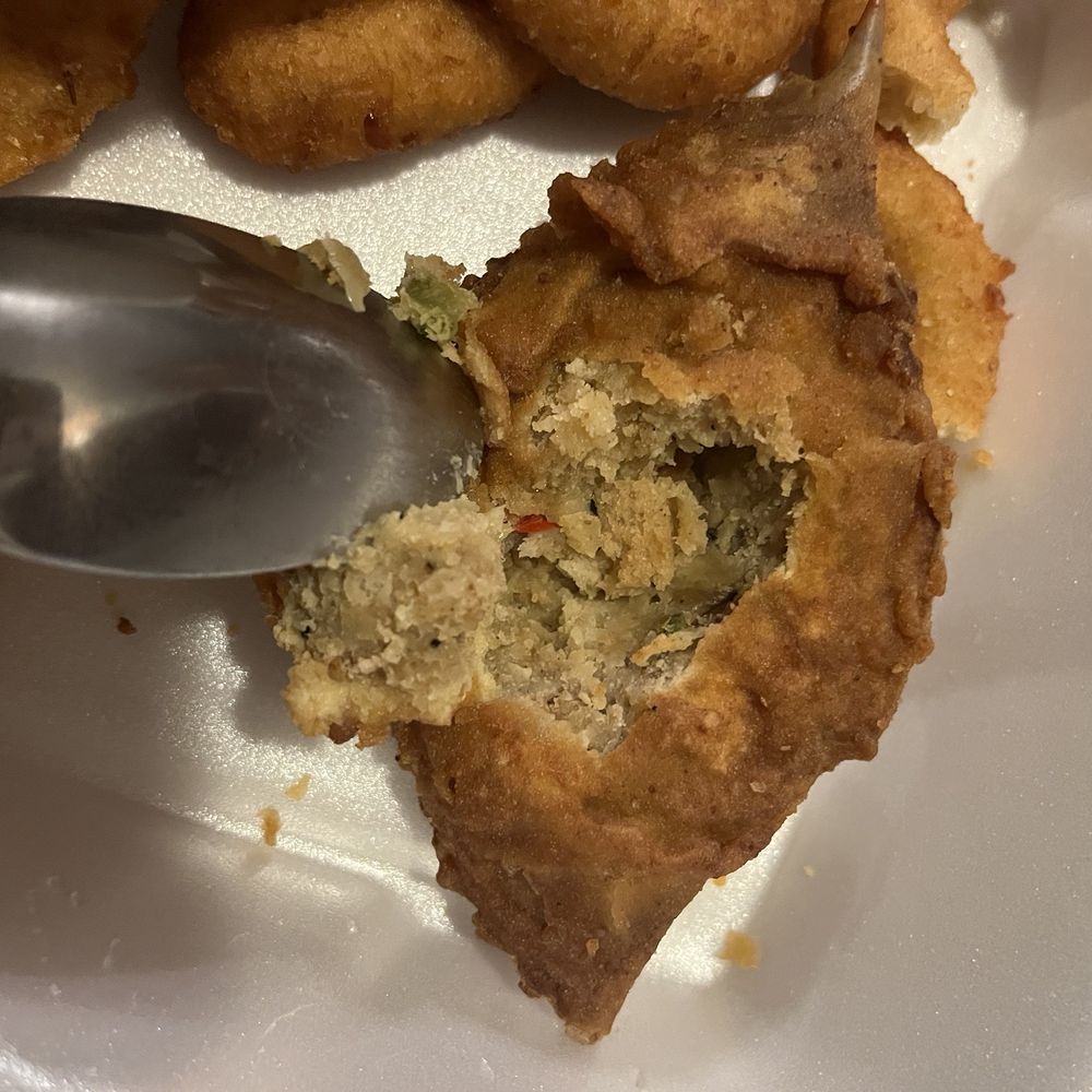 Mayflower Seafood - Inside of the over cooked over breaded stuffed no crab  cake - Seafood Near Me - Burlington, North Carolina