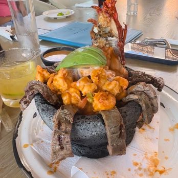 Encanto - Shrimp, lobster, asada molcajete....can't remember the actual name but DELICIOUS and a little of food! This can feed 2-3 people I think! - Seafood Near Me - Ensenada, BCN Encanto - Shrimp, lobster, asada molcajete....can't remember the actual name but DELICIOUS and a little of food! This can feed 2-3 people I think! - Seafood Near Me - Ensenada, BCN