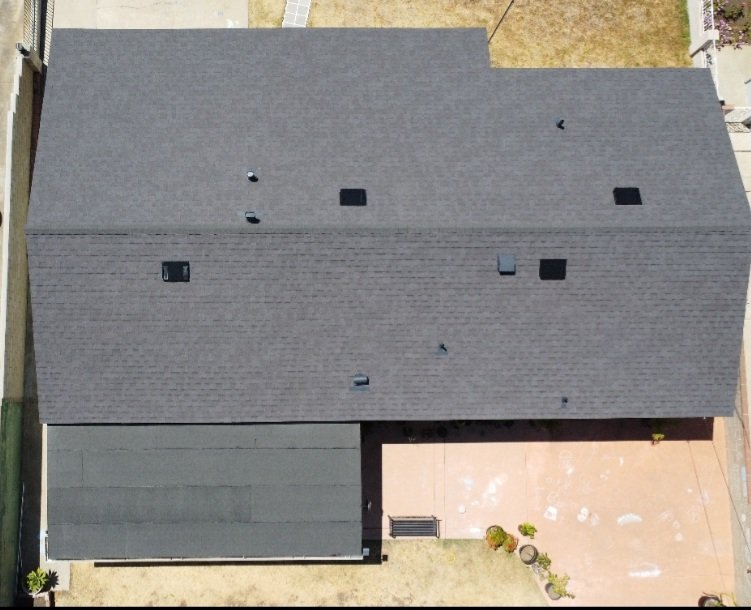 Slide of SZ Roofing