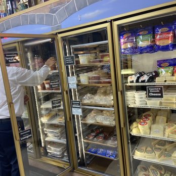 Dearborn Italian Bakery - a man standing in front of a refrigerator - Bakeries Near Me - Dearborn, Michigan Dearborn Italian Bakery - a man standing in front of a refrigerator - Bakeries Near Me - Dearborn, Michigan