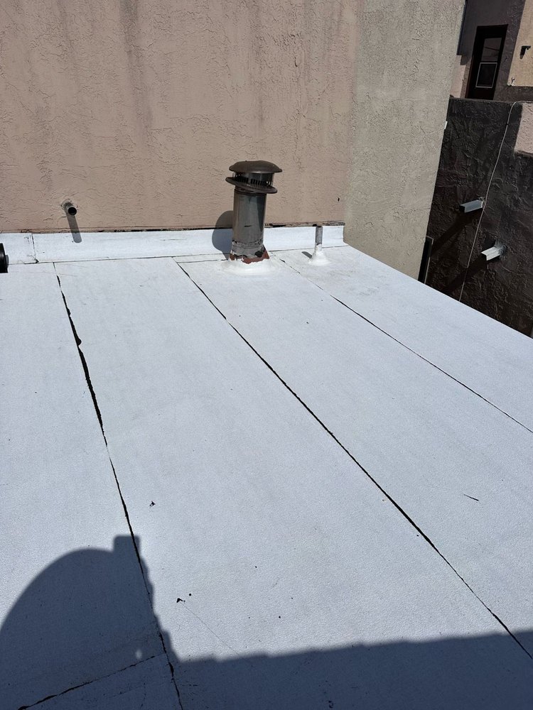 Slide of Tecun’s Roofing