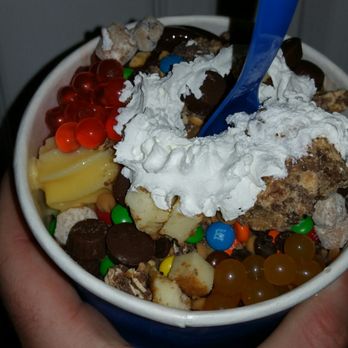 Spoons Frozen Yogurt - a person holding a bowl of ice cream - Ice Cream & Frozen Yogurt Near Me - Porterville, California Spoons Frozen Yogurt - a person holding a bowl of ice cream - Ice Cream & Frozen Yogurt Near Me - Porterville, California