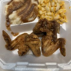 A Matter of Taste Restaurant - Fried chicken wings, mashed potatoes with gravy and macaroni and cheese