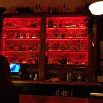 The Whisky Bar - Alcohol wall behind the bar - Scottish Near Me - Seattle, Washington The Whisky Bar - Alcohol wall behind the bar - Scottish Near Me - Seattle, Washington