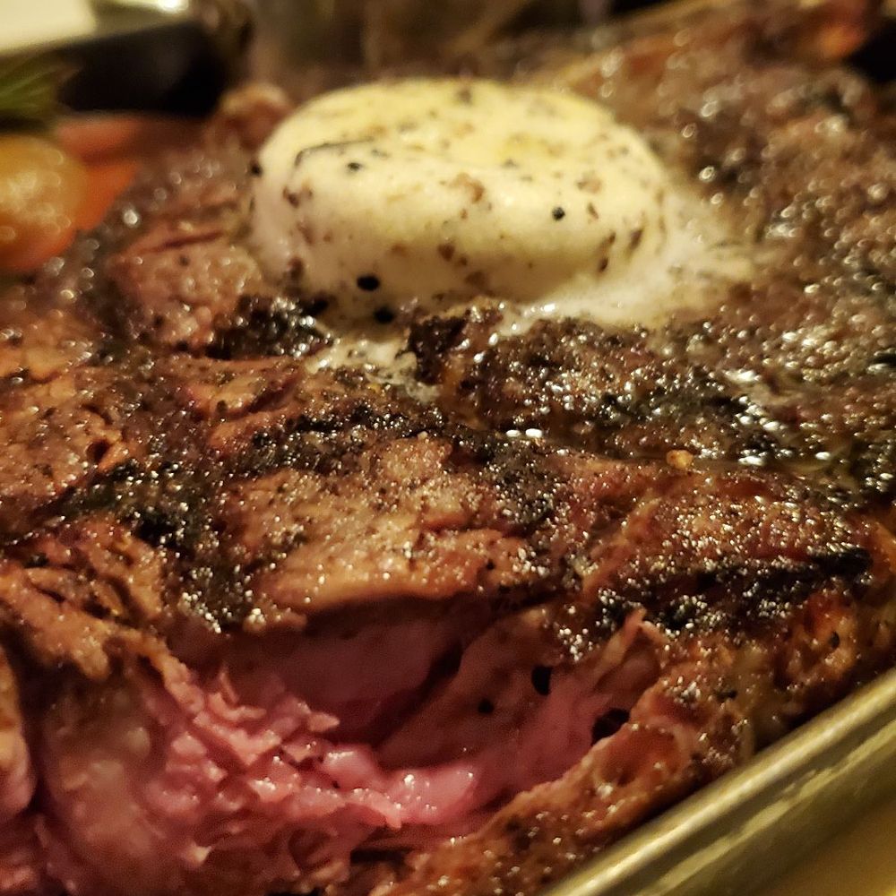 Dawson's - Bone-In Ribeye - Brandt Beef with truffle butter (Medium) - Steakhouses Near Me - Sacramento, California Dawson's - Bone-In Ribeye - Brandt Beef with truffle butter (Medium) - Steakhouses Near Me - Sacramento, California