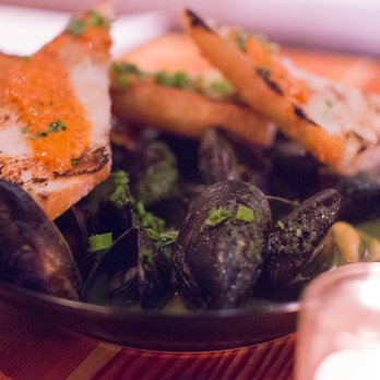 Lechon - Sautéed mussels - Tapas Bars Near Me - Portland, Oregon Lechon - Sautéed mussels - Tapas Bars Near Me - Portland, Oregon