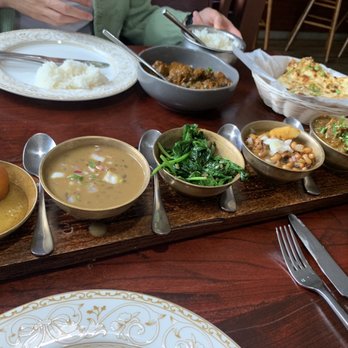 Royal Nepal - Royal Yak Curry comes with a bunch of different small dishes to try. - Himalayan/Nepalese Near Me - Alexandria, Virginia