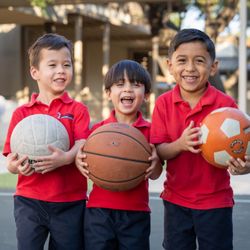 St. George Episcopal School - Lower school playing during PE!
