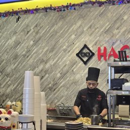Man cooking to go orders