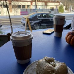Caruso’s Cafe - Spinach bagel with vegetable cream cheese and a small chai tea