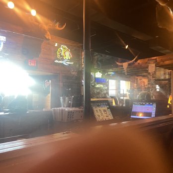Texas Roadhouse - This is a picture of the plexiglass the surrounding are both backed up to the entryway or the servers were assigned to you - Steakhouses Near Me - Bradley, Illinois