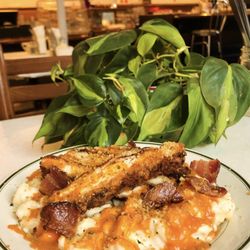 Bumblebee Bistro - Our housemade fried chicken tossed in buffalo sauce and served with our 3 cheese Mac & Cheese.