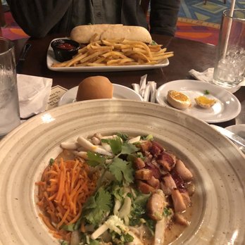 Kona Cafe - Pork belly noodle bowl, chicken sandwich served with fries - Sushi Bars Near Me - Lake Buena Vista, Florida Kona Cafe - Pork belly noodle bowl, chicken sandwich served with fries - Sushi Bars Near Me - Lake Buena Vista, Florida