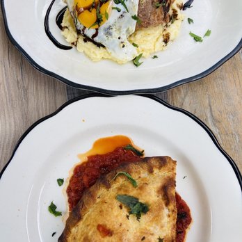 The Cookery - Pork Confit with fried egg over bed of polenta and pie crust pasta - Italian Near Me - Dobbs Ferry, New York The Cookery - Pork Confit with fried egg over bed of polenta and pie crust pasta - Italian Near Me - Dobbs Ferry, New York
