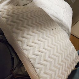 Weird cushion that get set up as a 1 of the 4 pillows. Where did your thing even come from? Prob left behind by a guest. Weird cushion that get set up as a 1 of the 4 pillows. Where did your thing even come from? Prob left behind by a guest.