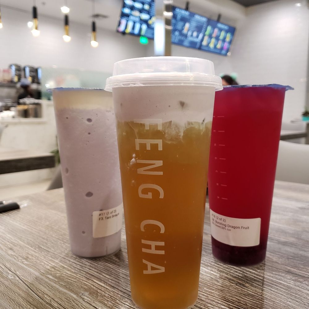 Feng Cha - Milpitas - Rose Tea ($4.25) + Taro Milk Foam ($1.25) in front Taro Breeze ($5.75) on the left - Desserts Near Me - Milpitas, California Feng Cha - Milpitas - Rose Tea ($4.25) + Taro Milk Foam ($1.25) in front Taro Breeze ($5.75) on the left - Desserts Near Me - Milpitas, California