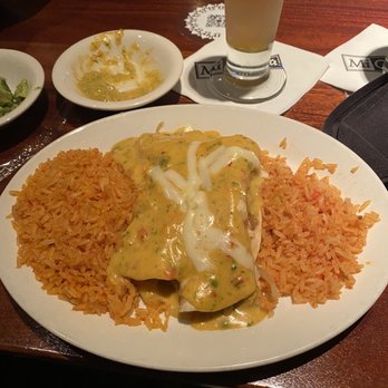 Mi Cocina - This was the sunset enchiladas(flour) with double rice paired with the Dilema (drink). - Mexican Near Me - Irving, Texas Mi Cocina - This was the sunset enchiladas(flour) with double rice paired with the Dilema (drink). - Mexican Near Me - Irving, Texas
