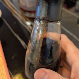 The soy sauce bottle was weirdly caked in something