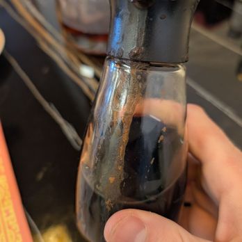 New Peking - The soy sauce bottle was weirdly caked in something - Chinese Near Me - Vancouver, Washington