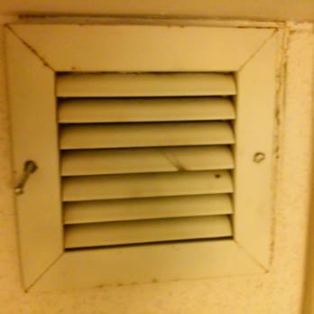 Travelodge by Wyndham Adrian - Dirty vent (bathroom) with a loose screw on its left side. - Hotels Near Me - Adrian, Michigan Travelodge by Wyndham Adrian - Dirty vent (bathroom) with a loose screw on its left side. - Hotels Near Me - Adrian, Michigan