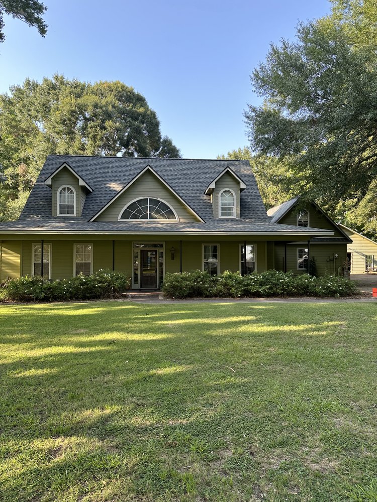 Slide of Delta South Roofing