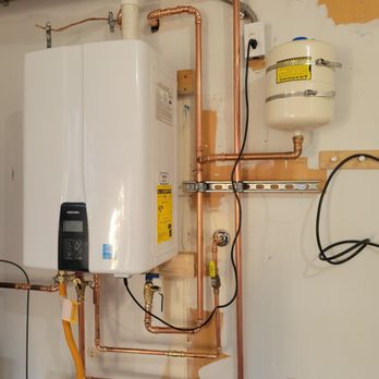 Goldstar Plumbing - New Tankless water heater installation - Plumbing Near Me - Seattle, Washington Goldstar Plumbing - New Tankless water heater installation - Plumbing Near Me - Seattle, Washington