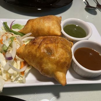 The Chennai Cafe - Meat (spice ground turkey) samosa with fresh made spice mint and tamarind chutneys - Indian Near Me - Shoreline, Washington The Chennai Cafe - Meat (spice ground turkey) samosa with fresh made spice mint and tamarind chutneys - Indian Near Me - Shoreline, Washington