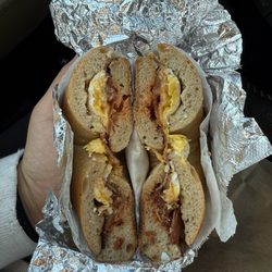 Sam I Am Bagels - Bacon, egg and cheese on a cinnamon raisin bagel scooped out