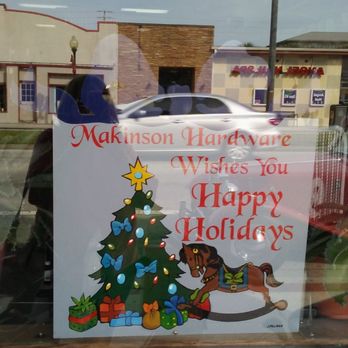 Historic Downtown - Sign on the front window of the hardware store wishing everyone a happy holiday. - Landmarks & Historical Buildings Near Me - Kissimmee, Florida Historic Downtown - Sign on the front window of the hardware store wishing everyone a happy holiday. - Landmarks & Historical Buildings Near Me - Kissimmee, Florida
