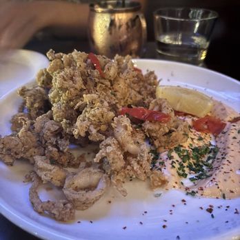 Von's 1000 Spirits - Crispy Calamari and salmon pasta - New American Near Me - Seattle, Washington Von's 1000 Spirits - Crispy Calamari and salmon pasta - New American Near Me - Seattle, Washington