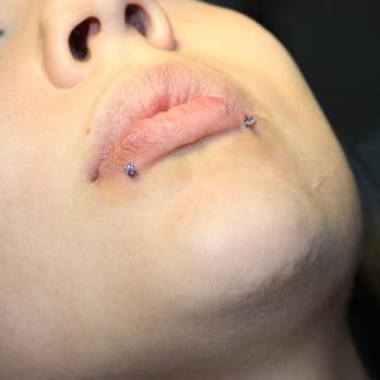 Black Hole Body Piercing - immediately after piercings were done. - Jewelry Near Me - Reno, Nevada Black Hole Body Piercing - immediately after piercings were done. - Jewelry Near Me - Reno, Nevada