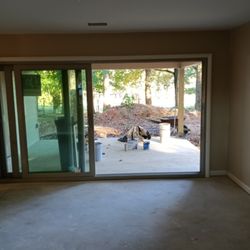 Build Up construction - New master suite with a massive sliding door to a private patio.