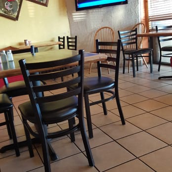 Los Amigos - tables and chairs in a restaurant - Mexican Near Me - Pasadena, Texas Los Amigos - tables and chairs in a restaurant - Mexican Near Me - Pasadena, Texas