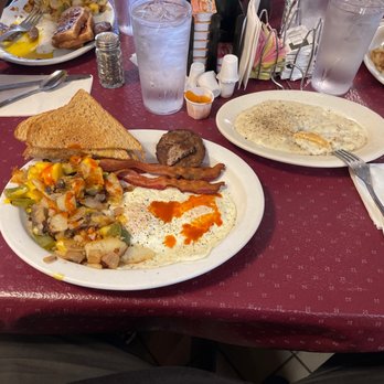 Potato Shak - Eggs potatoes loaded and double bacon sausage and 1/2 order biscuits and gravy. - Breakfast & Brunch Near Me - Loves Park, Illinois Potato Shak - Eggs potatoes loaded and double bacon sausage and 1/2 order biscuits and gravy. - Breakfast & Brunch Near Me - Loves Park, Illinois