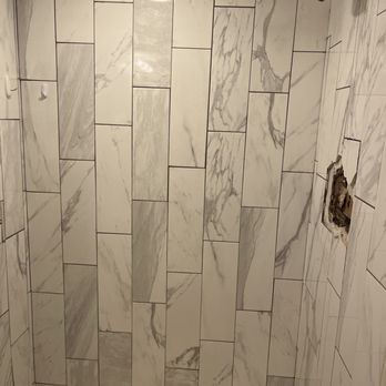 CG Renovation Services - Old, poorly tiled shower that needed renovation - General Contractors Near Me