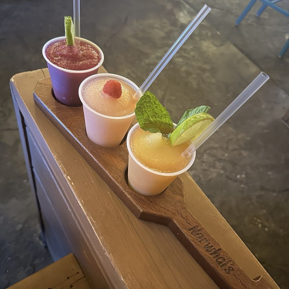 Narwhal's Crafted - Slushie Flight: Dragon Fruit Vodka Tonic(left), Peach Bellini(middle), Passion Fruit Punch(right) - Cocktail Bars Near Me - Saint Louis, Missouri Narwhal's Crafted - Slushie Flight: Dragon Fruit Vodka Tonic(left), Peach Bellini(middle), Passion Fruit Punch(right) - Cocktail Bars Near Me - Saint Louis, Missouri