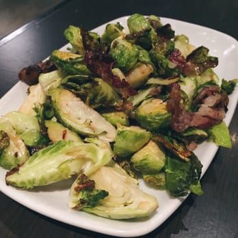Vivo Ristorante - Cavoletti di bruxelles: roasted brussel sprouts, pancetta, and spicy honey $16 - Italian Near Me - Edmonton, Alberta Vivo Ristorante - Cavoletti di bruxelles: roasted brussel sprouts, pancetta, and spicy honey $16 - Italian Near Me - Edmonton, Alberta
