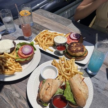 Harbor Lights - Steak Sandwich, Angus Burger and crab cake sandwich. Drinks: golden sunset and Water street - Seafood Near Me - Norwalk, Connecticut