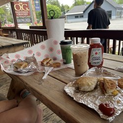 Oquossoc Grocery - Bacon egg and cheese biscuit, hash browns, iced coffee, got coffee and the delicious bacon breakfast burrito !