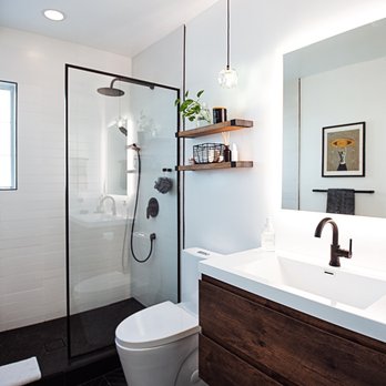 LJ Construct - a modern bathroom with a walk in shower - General Contractors Near Me