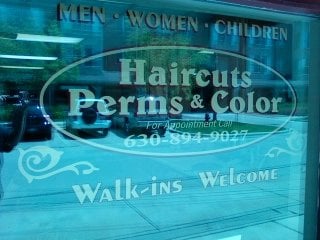 Ron & Cindy's Barber & Styling Shop Logo