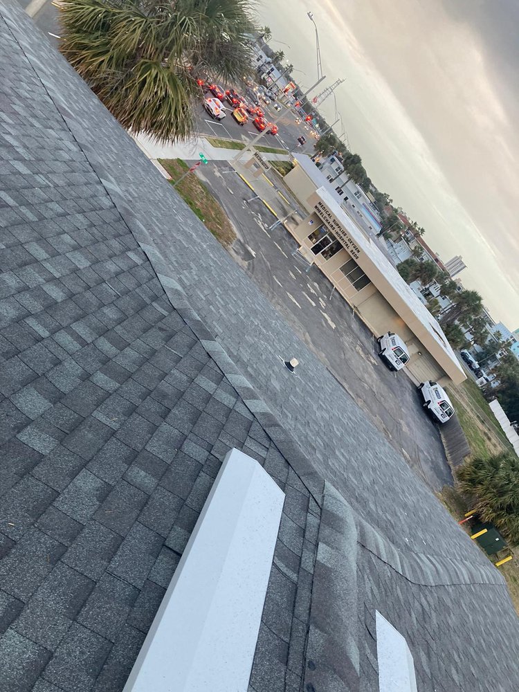 Slide of Payless Roofing