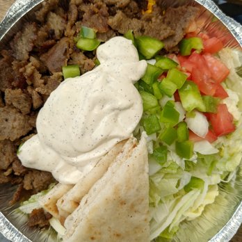 The Halal Guys - Beef Gyro Platter: lettuce, tomato, pepper, pita bread, rice, and white sauce - Halal Near Me - Seattle, Washington