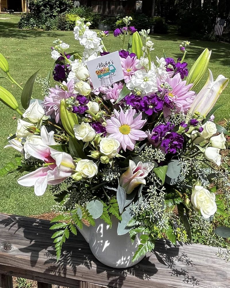 Alisha’s Flower Cinsations Logo