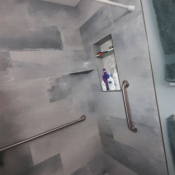 Thompsons General Construction - a shower in a bathroom - General Contractors Near Me